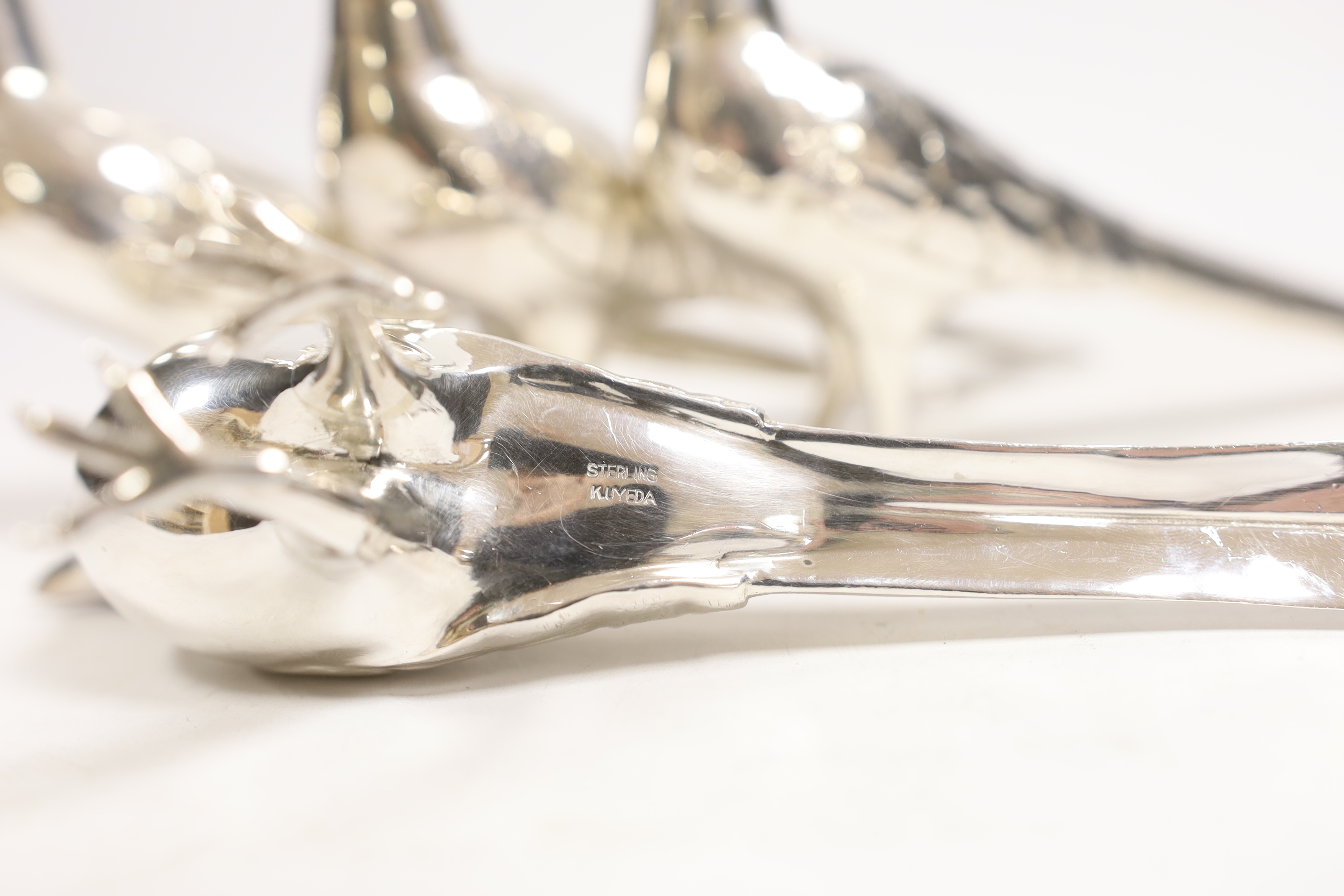 A set of four Japanese sterling condiments, by Kichigoro Uyeda, modelled as game birds, height 93mm, 16oz.